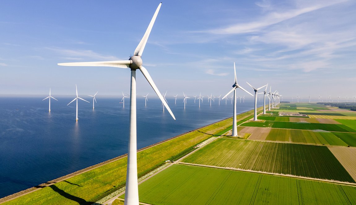 Windmills turbines generating electricity, green energy the Netherlands