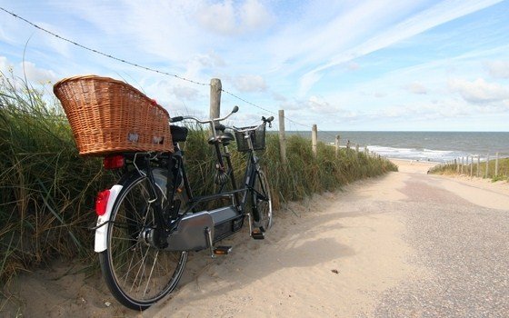 A tandem parked near the beach
