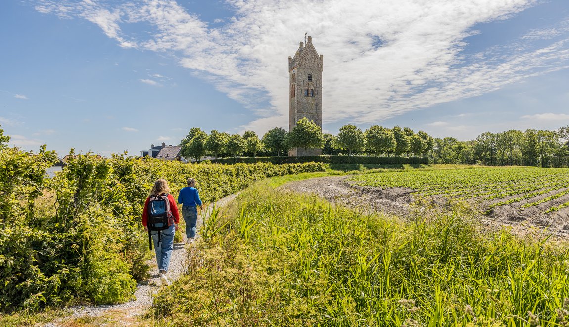 Couple walks to Firdgum church tower Couple walks to Firdgum church tower