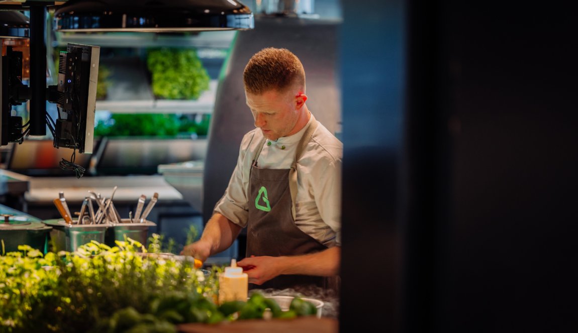 Cook in kitchen of Greenhouse in Utrecht