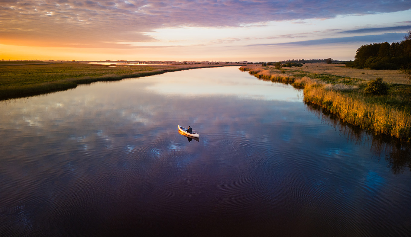 Canoe at evening light in Lauwersmeer National Park