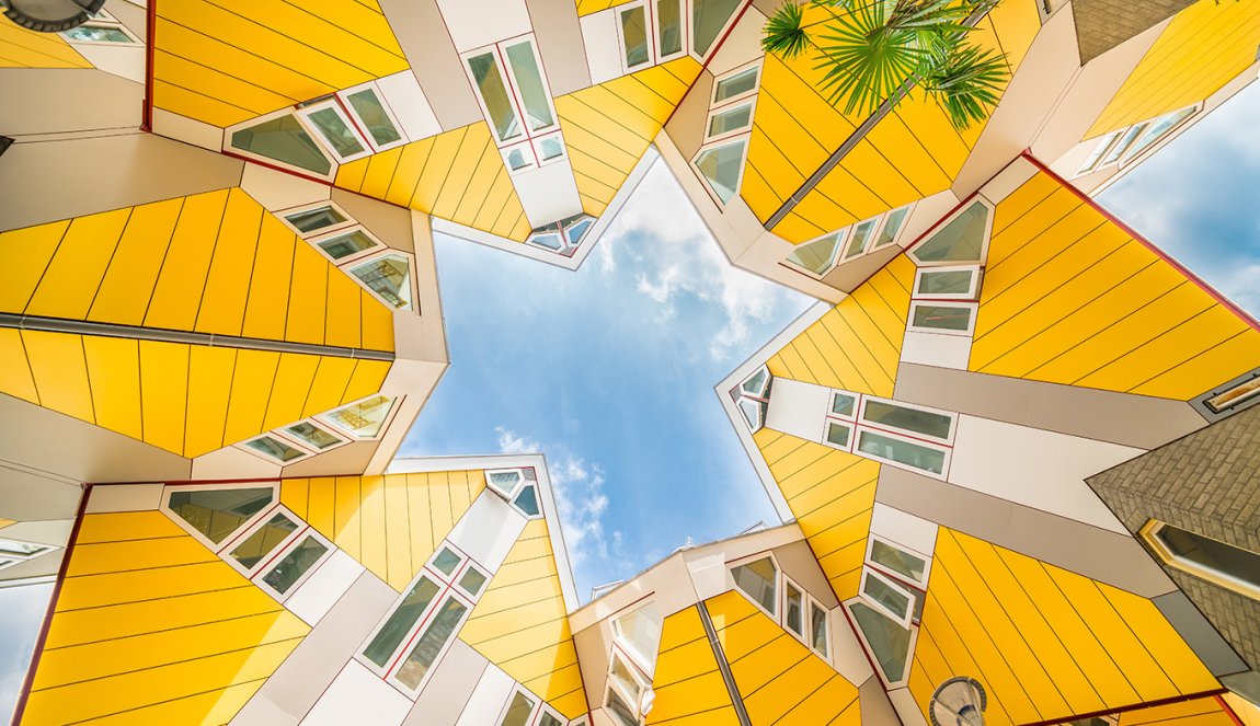 Quirky yellow architecturally unusual angular cube Dutch architect Piet Blom