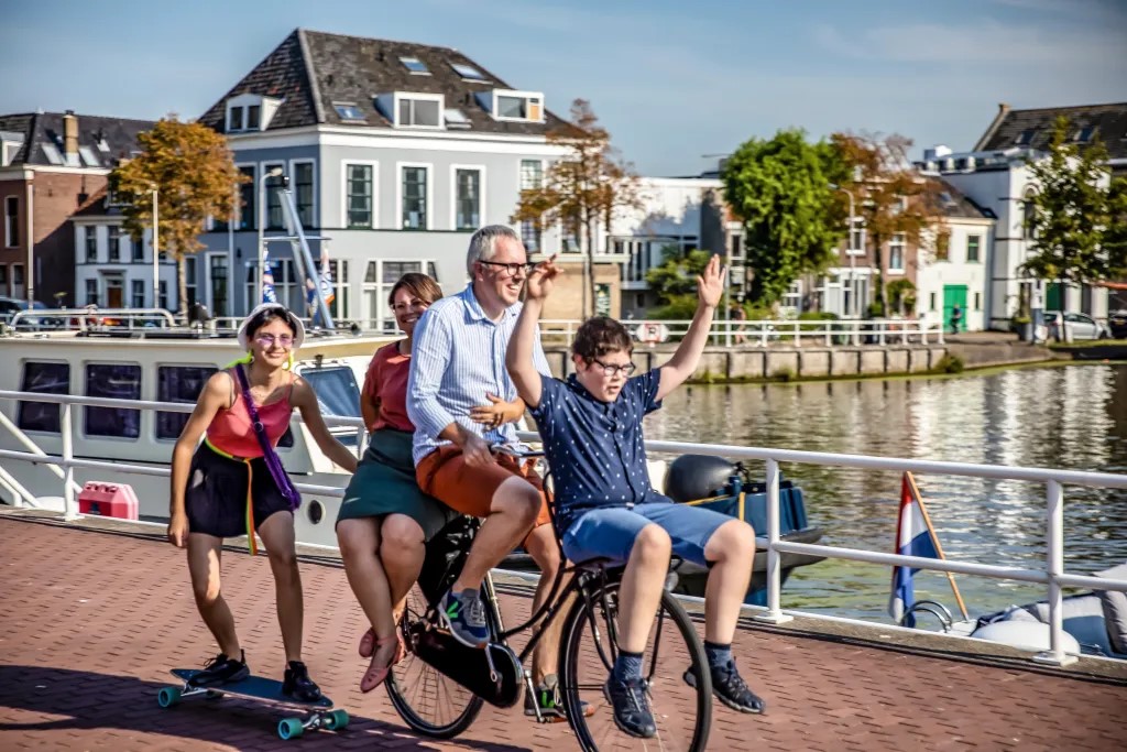 Chris Bruntlett on a bike with family