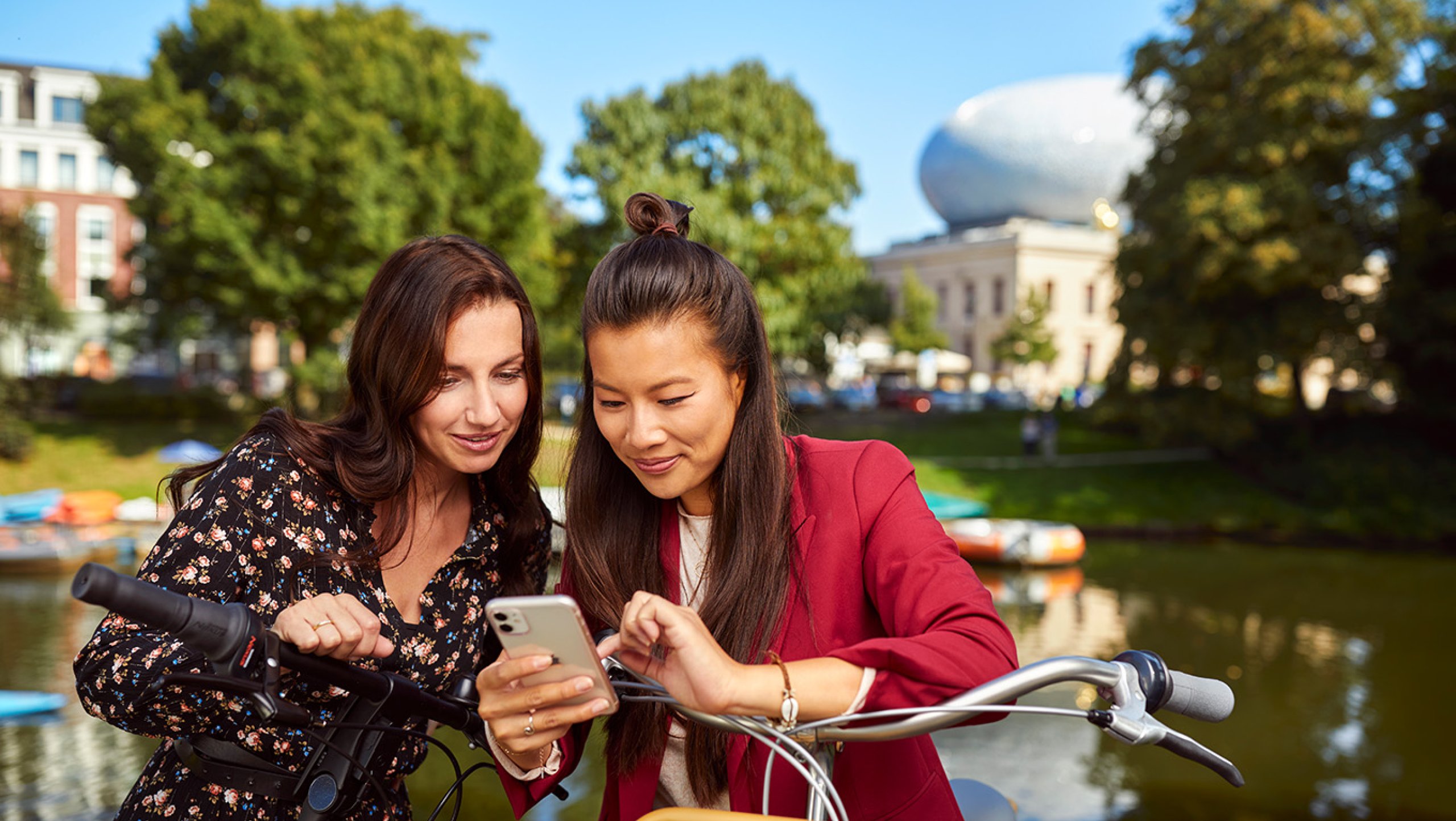 Ladies with mobile in front of the Fundatie in Zwolle Hanseatic cities